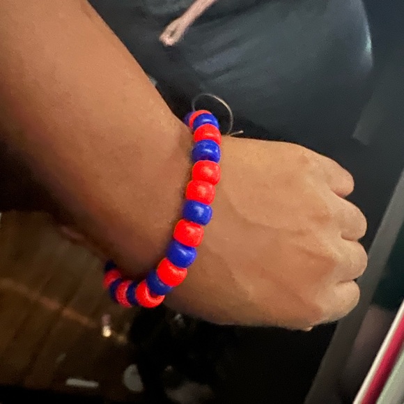 I am selling bracelets to help buy a new phone. Can you help me reach my goal? - Picture 2 of 5